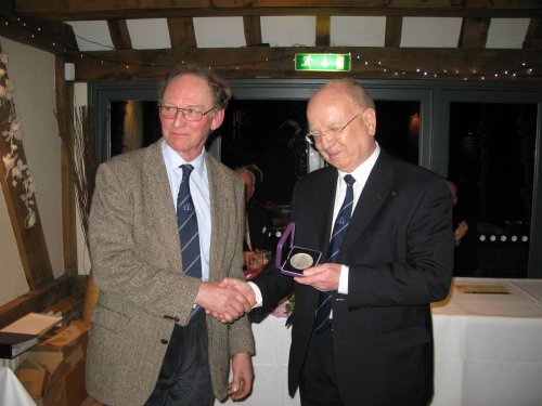 David Simmonds presents John Breach with his David Hilton Memorial Medallion