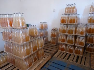 Juice made from fruit brought in by small growers ready for collection